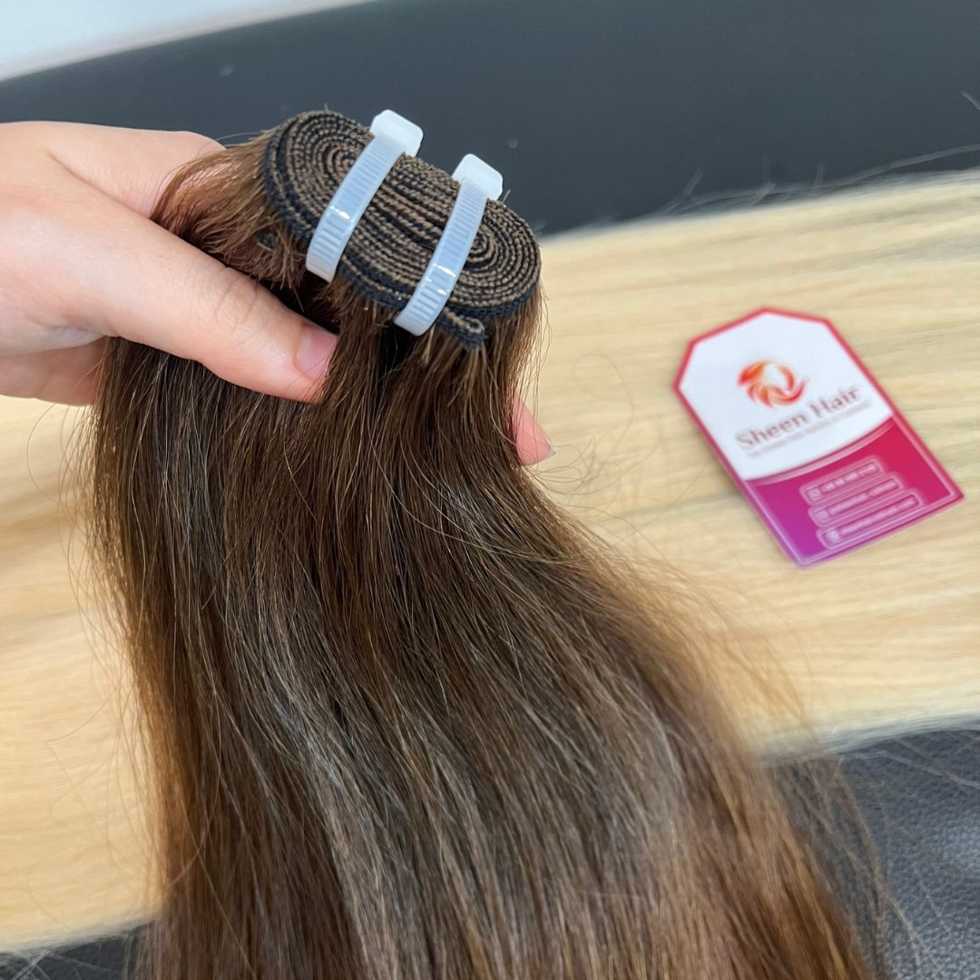 Close-up of double wefted machine stitching Double wefted sewing hair 